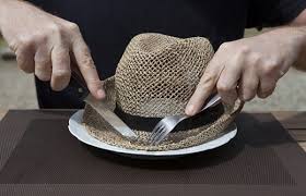manger son chapeau